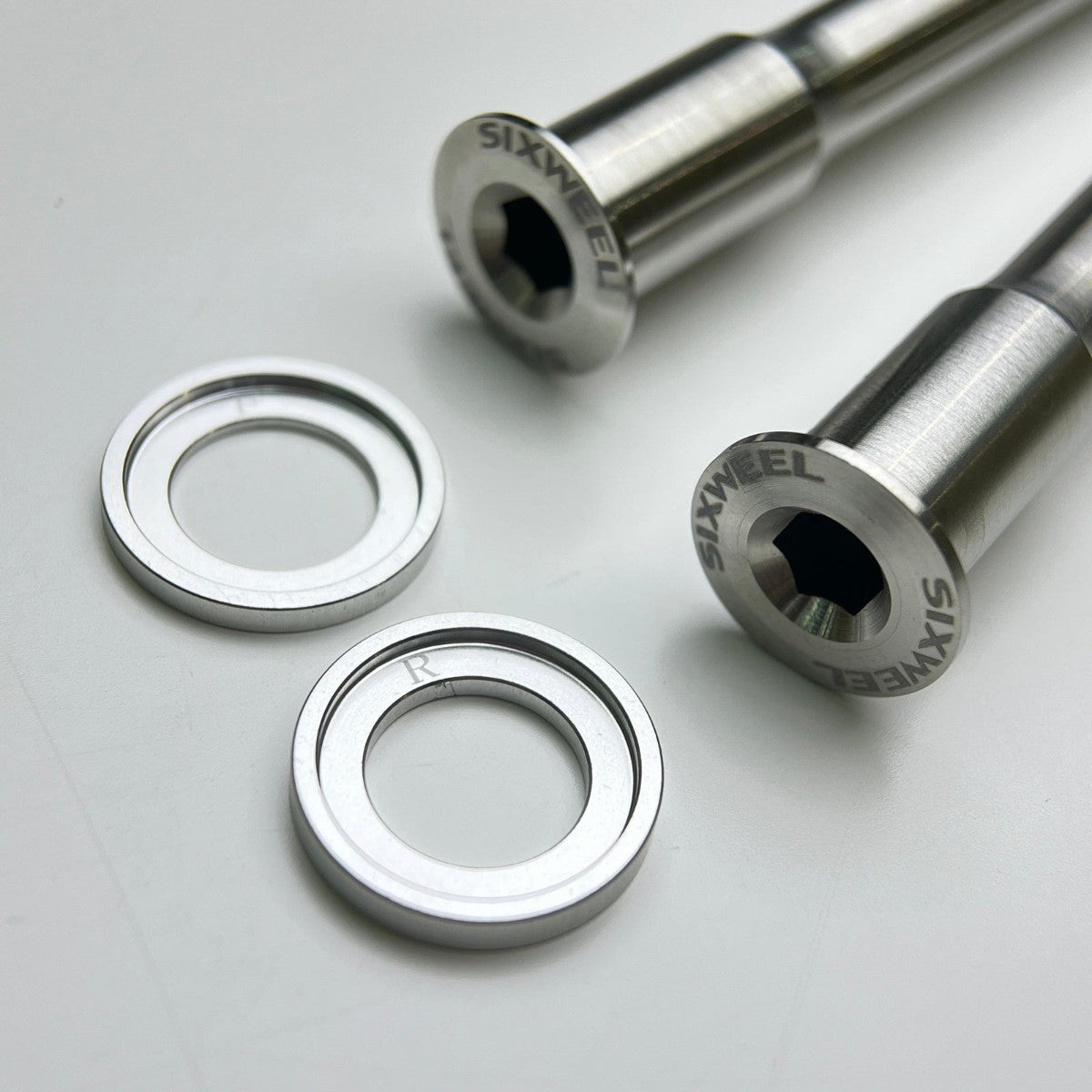 Sixweel titanium thru-axle pair with washers